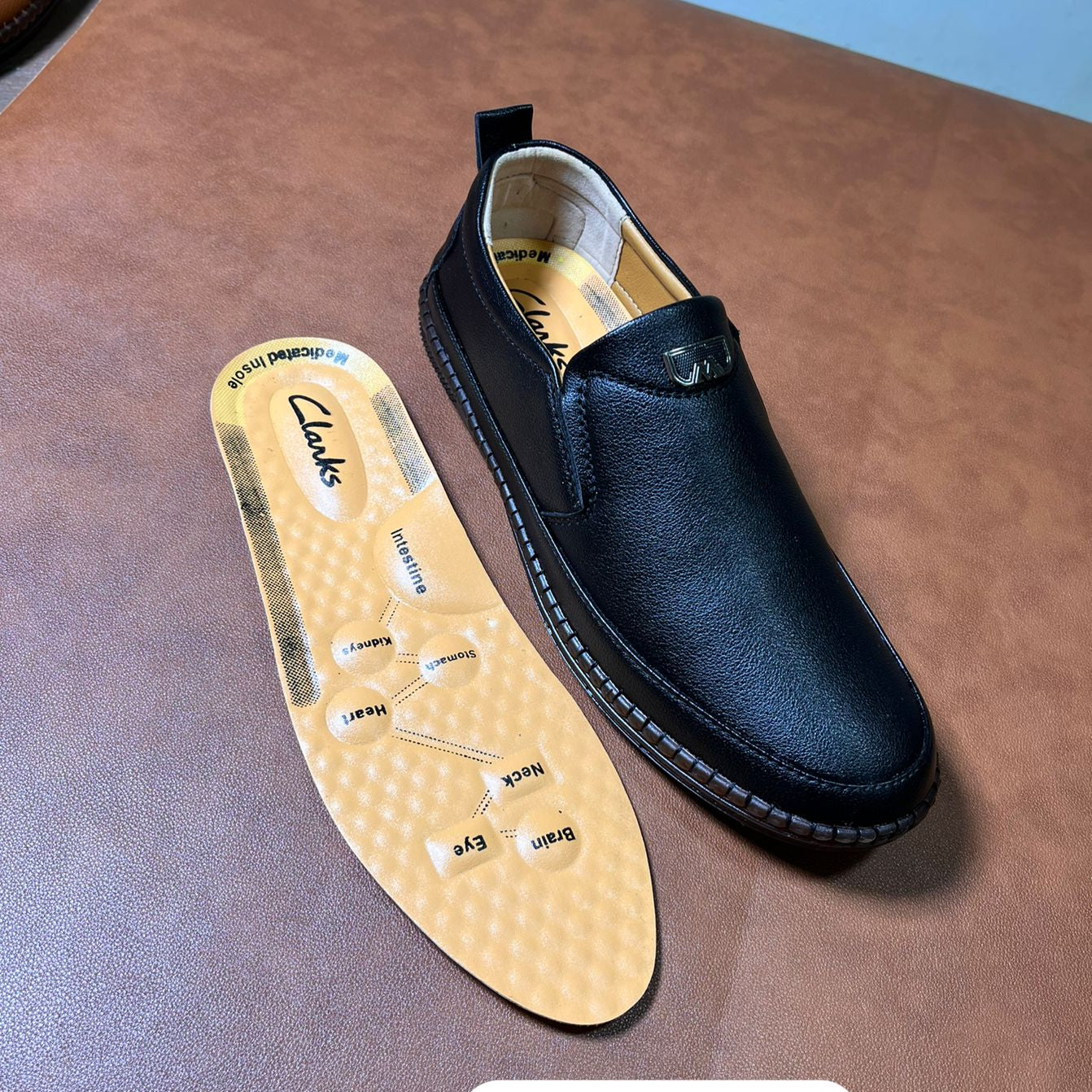 Clarks Premium Black Leather Slip-On Shoes for Men